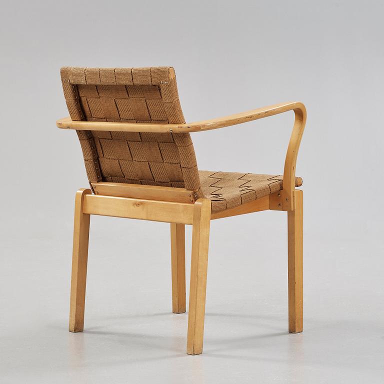 An Alvar Aalto armchair, made on license by Aalto Design, Hedemora for Artek, Sweden 1946-56.