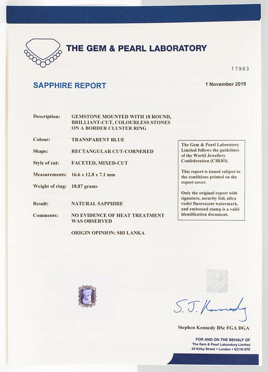 A platinum ring with a ca. 18.00 ct sapphire and ca. 3.00 cts of diamonds. With certificates.