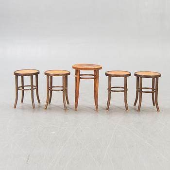 A set of five early 1900s stools.