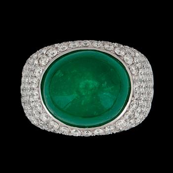 162. A cabochon cut emerald, circa 12.34 cts and pavé set diamonds, circa 3.59 cts, ring.