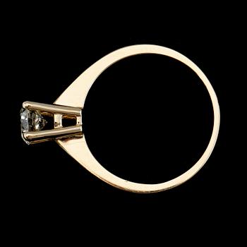 RING, 14K guld, solitär briljantslipad diamant ca 0.73 ct.