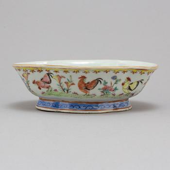 A famille rose footed dish, Qing dynasty, circa 1900.