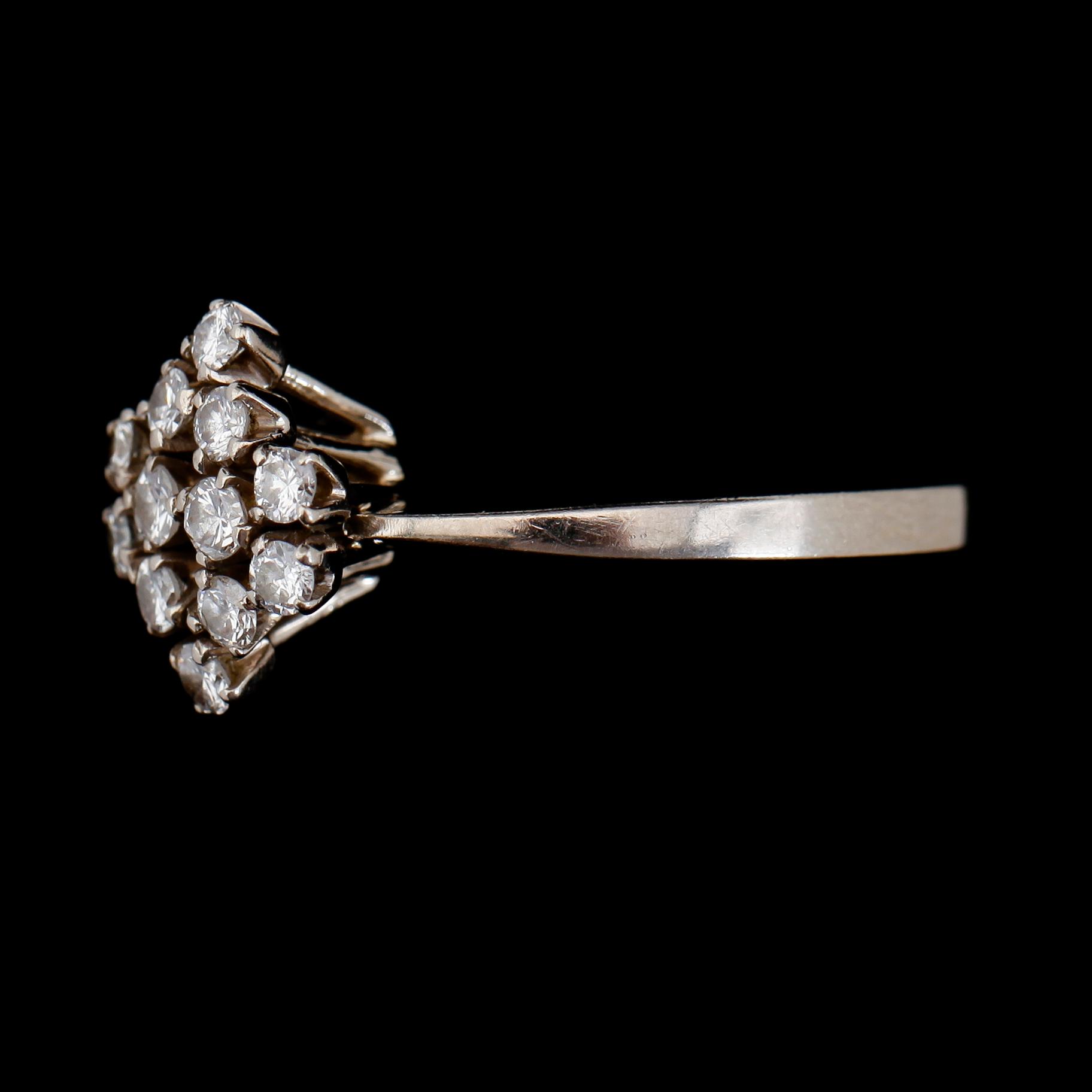 RING, 18K vitguld, briljantslipade diamanter tot ca 0.50 ct, ALP Stockholm 1976.