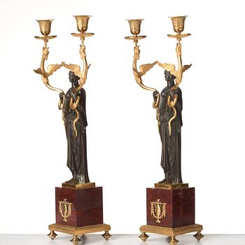 A pair of French Empire two-light candelabra, beginning of the 19th century.