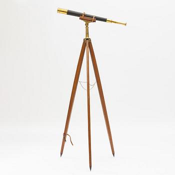 A 20th century telescope on a tripod.