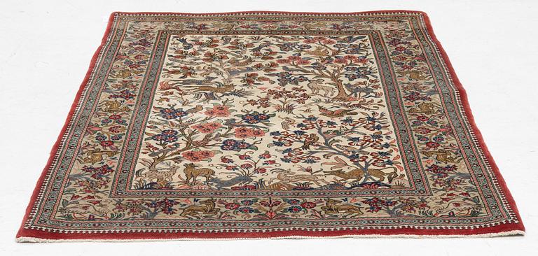 A figural Ghom, rug, c. 160 x 107 cm.