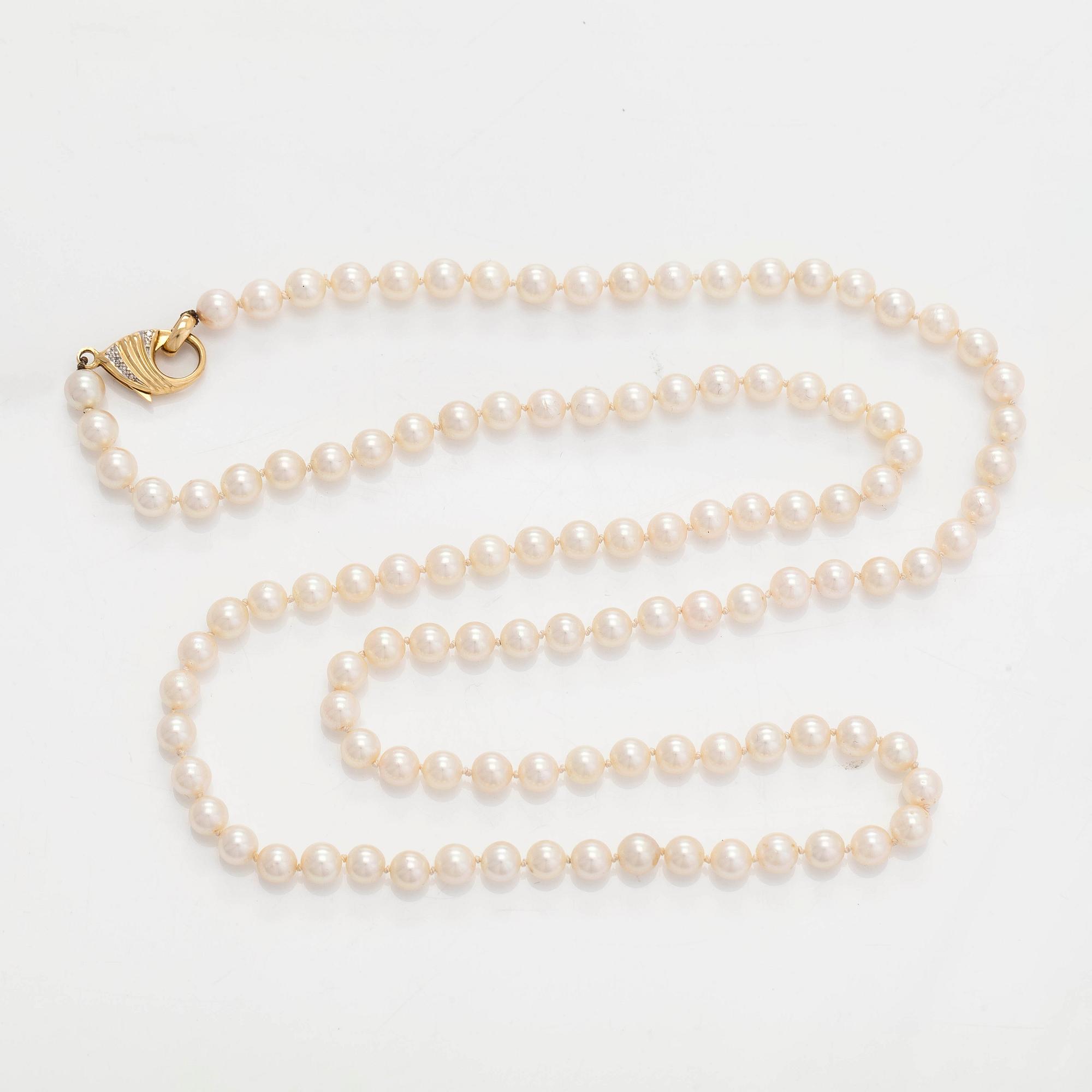 A cultured Akoya pearl necklace, clasp in 18K gold set with eight-cut diamonds. Swedish control mark.