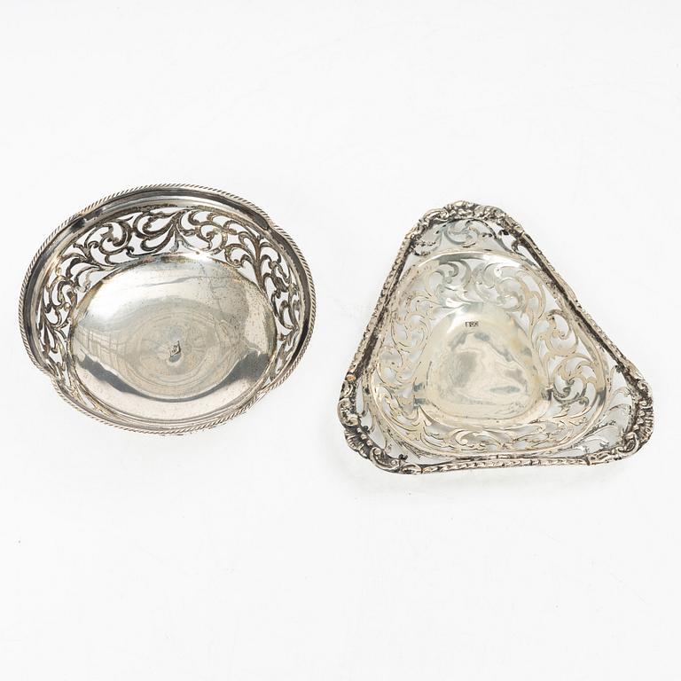 Two pierced silver bowls and two sugar spoons, including Sweden and Endland, 20th century.