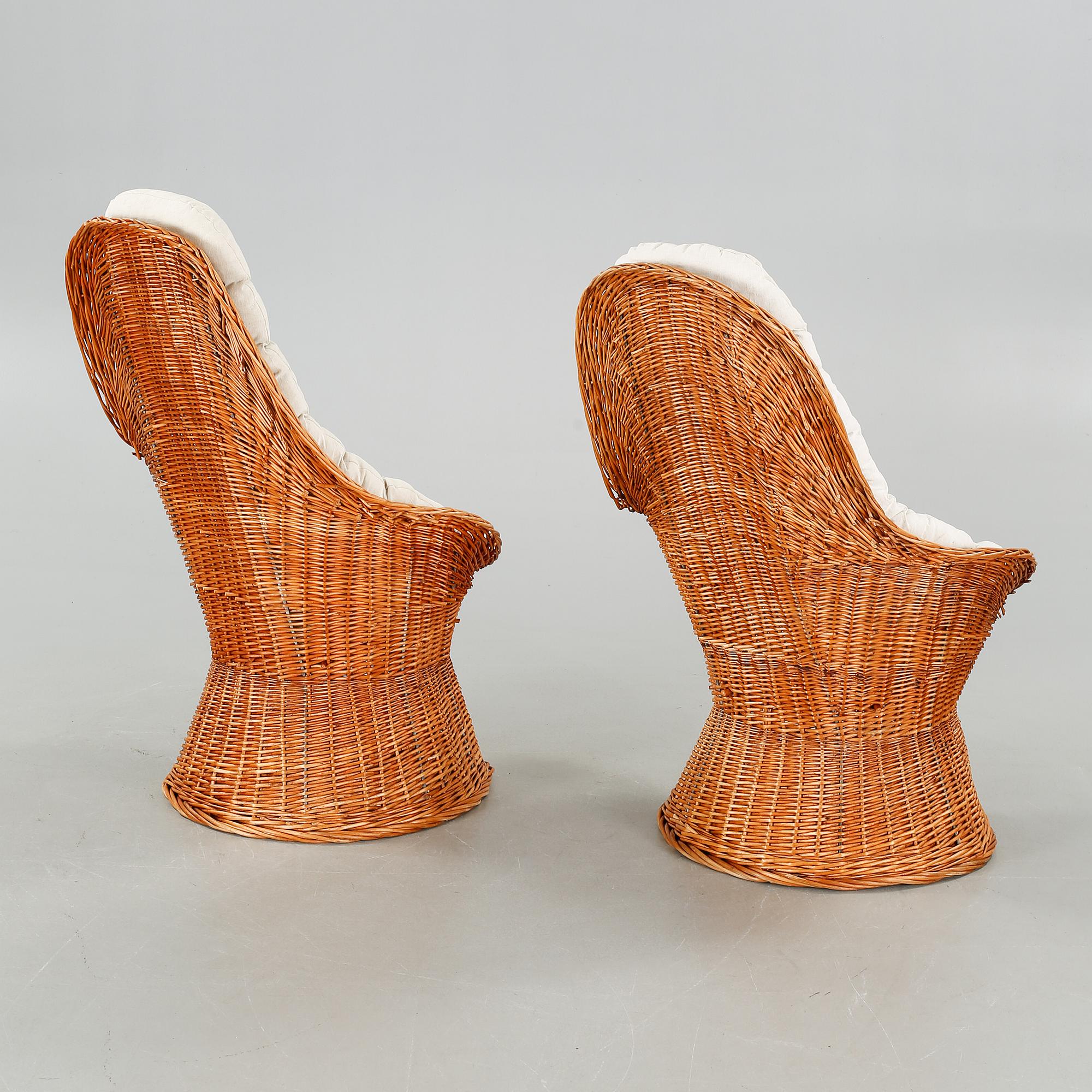 A pair of chairs and one table from the latter half of the 20th century.