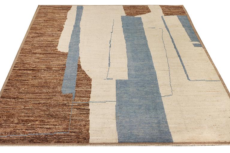 A Moroccan carpet, c. 307 x 250 cm.