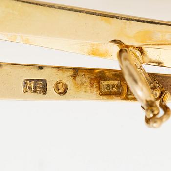 Brosch 18K guld med fasettslipade ädelstenar, H Strömdahl sannolikt 1961.