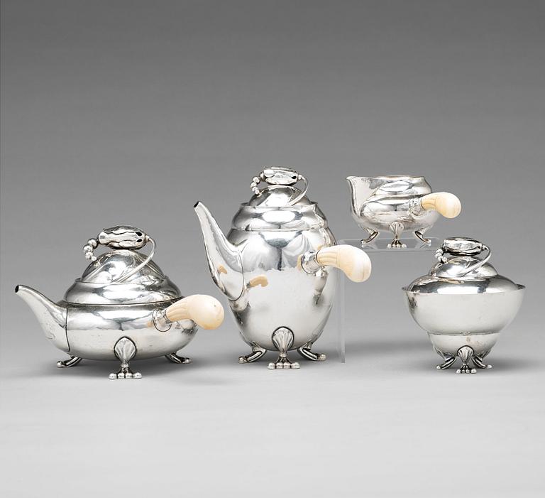 Georg Jensen, kaffe- och teservis, fyra delar, modell "Magnolia/Blossom", Köpenhamn 1918-1919, 830/1000 silver, design nr 2 samt 100.