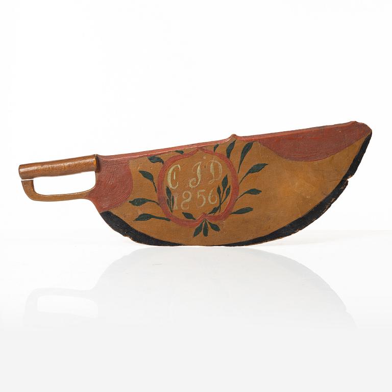 A carved and polychrome painted folk art wedding gift, Sweden, dated 1856.