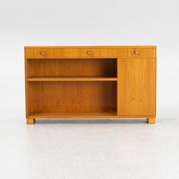 An elmwood-veneered bookcase, Nilsson & Johansson Möbelfabrik, Björnum, mid 20th century.