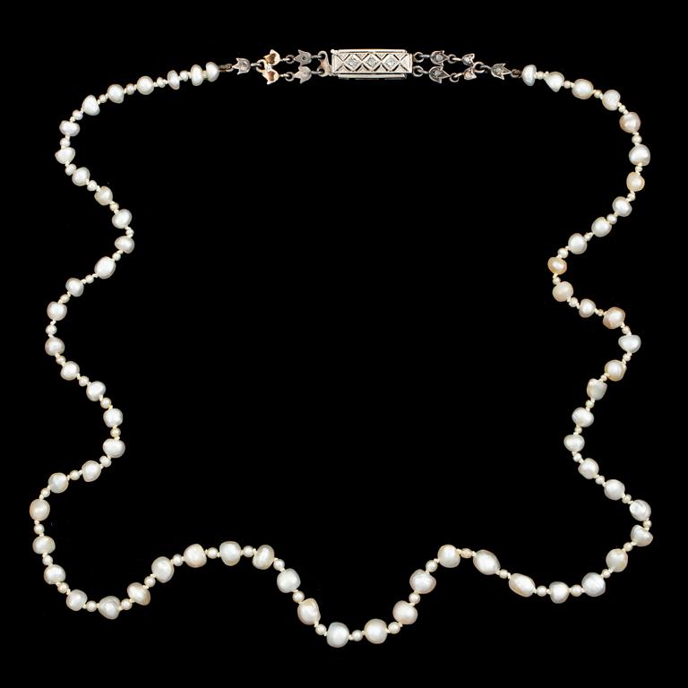 Pearl necklace, clasp with rose cut diamonds.
