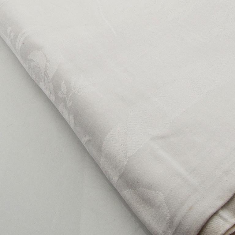 Tablecloth and napkins, 11 pcs, damask, first half/mid 20th century.