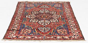 An Oriental carpet, circa 207 x 133 cm.