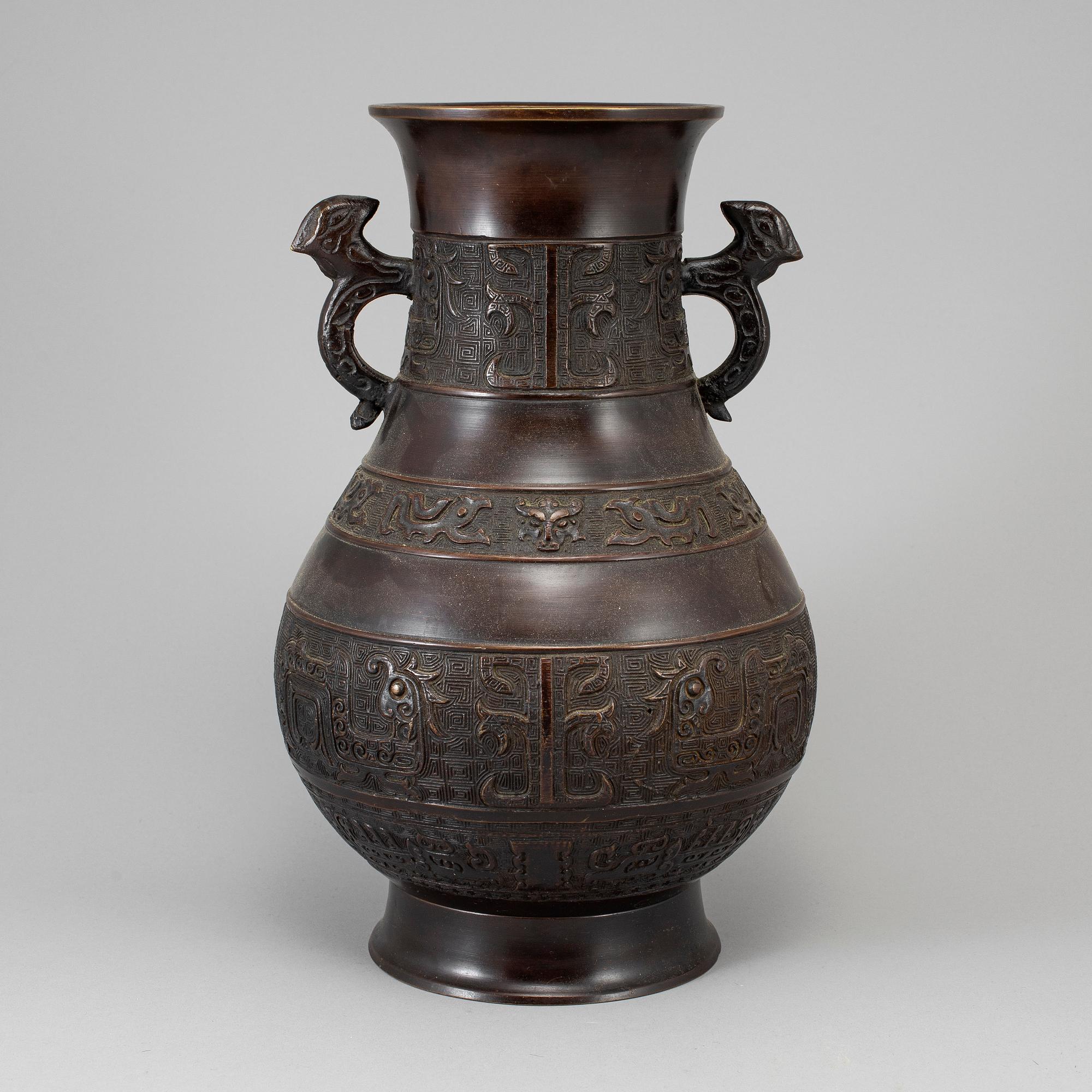 A bronze vase,  Japan, early 20th Century. After a Chinese archaic bronze model.