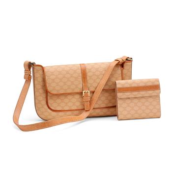 CÉLINE, a beige monogram canvas shoulderbag and wallet.