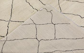 A Moroccan carpet, 202 x 154 cm.