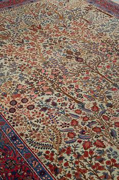 A CARPET, a semi-antique Tabriz probably, ca 393 x 284 cm.