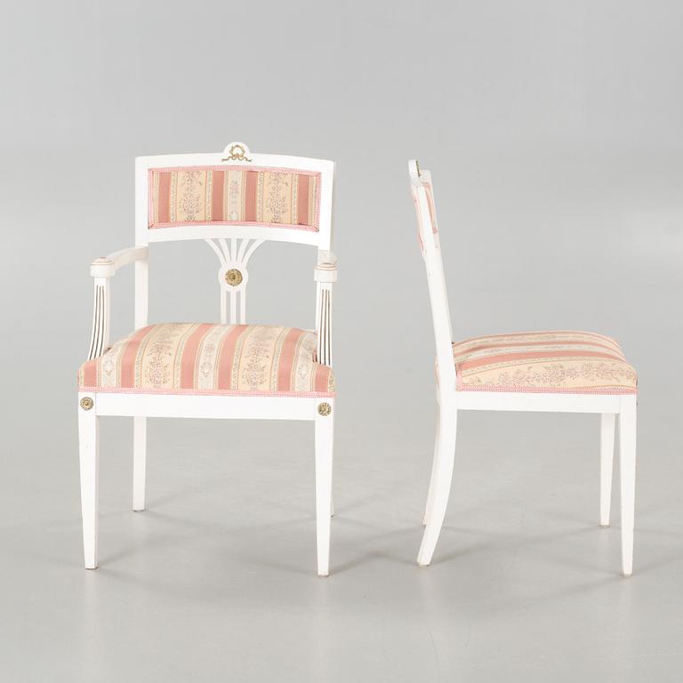 Two gustavian style armchairs and three chairs, first half of the 20th century.