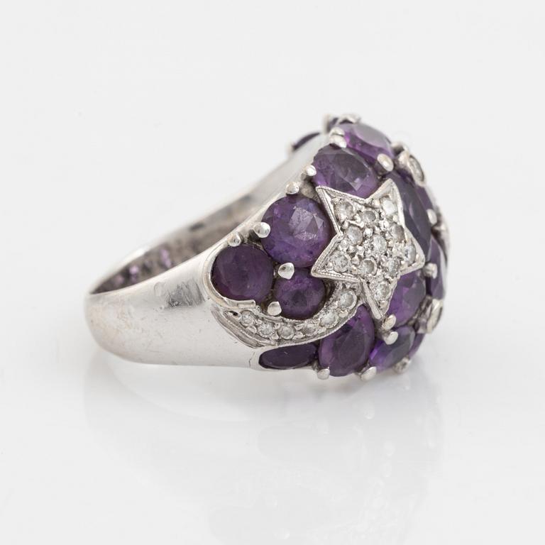 Ring med ametister och stjärnmönster med briljantslipade diamanter.