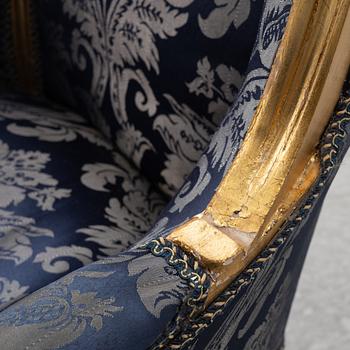 A pair of Louis XVI style armchairs, late 20th Century.