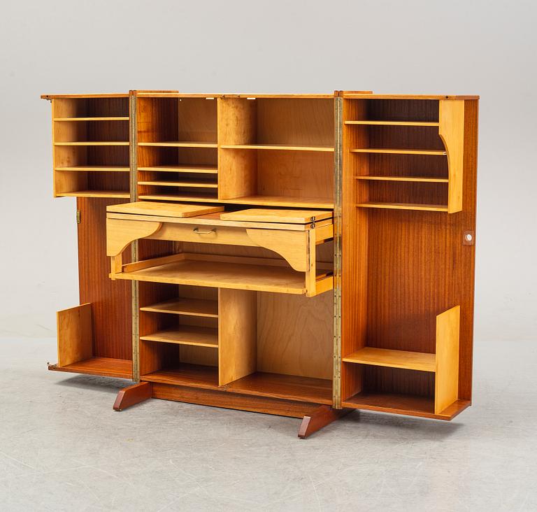 A mahogany veneered convertible cabinet, mid 20th Century.