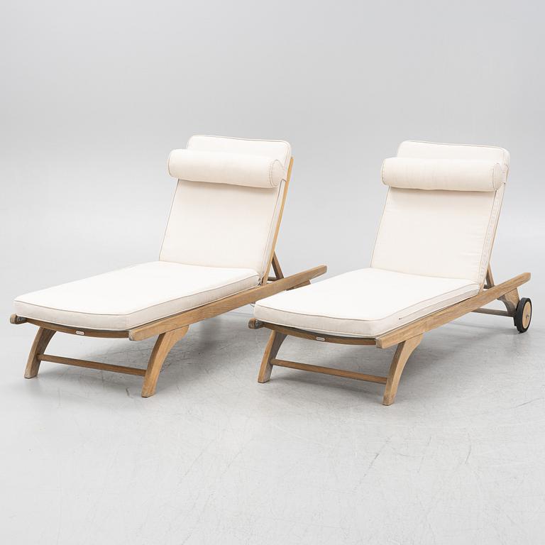 A pair of 'Columbus Sunbed' teak deck chairs, Skagerak, Denmark.