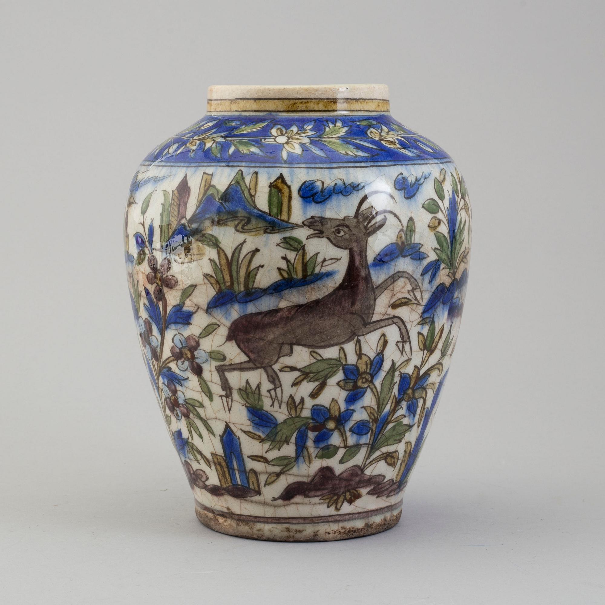 A POTTERY URN, probably late Qajar dynasty, Persia/Iran, height ca 27,5 cm.