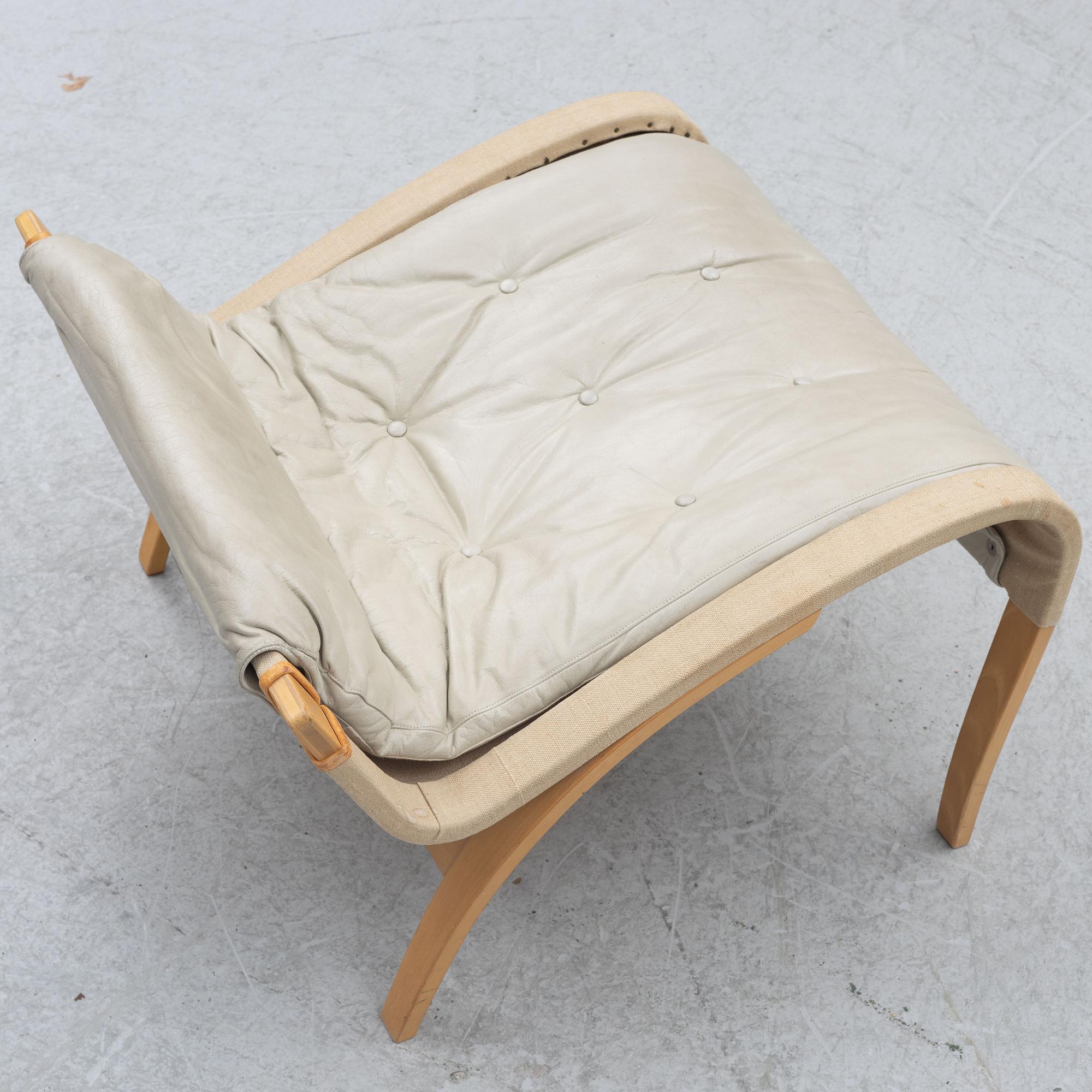 Bruno Mathsson, a 'Pernilla' easy chair witr foot stoll., Dux.