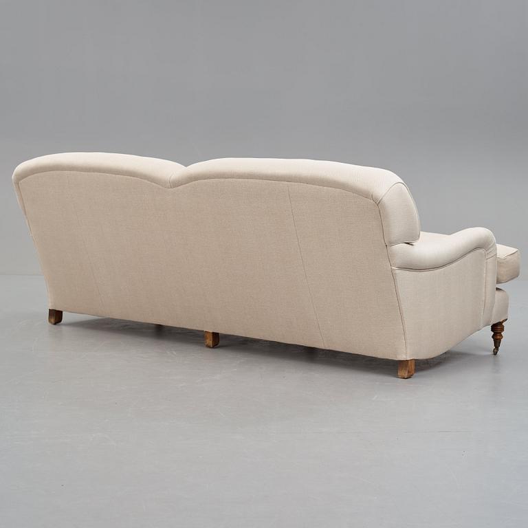 SOFA, "Howard", upholstered in an off-white fabric.