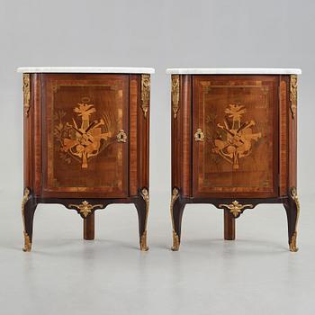 A pair of Louis XVI late 18th century corner cupboards by Léonard Boudin (1735-1804), master in Paris 1761.