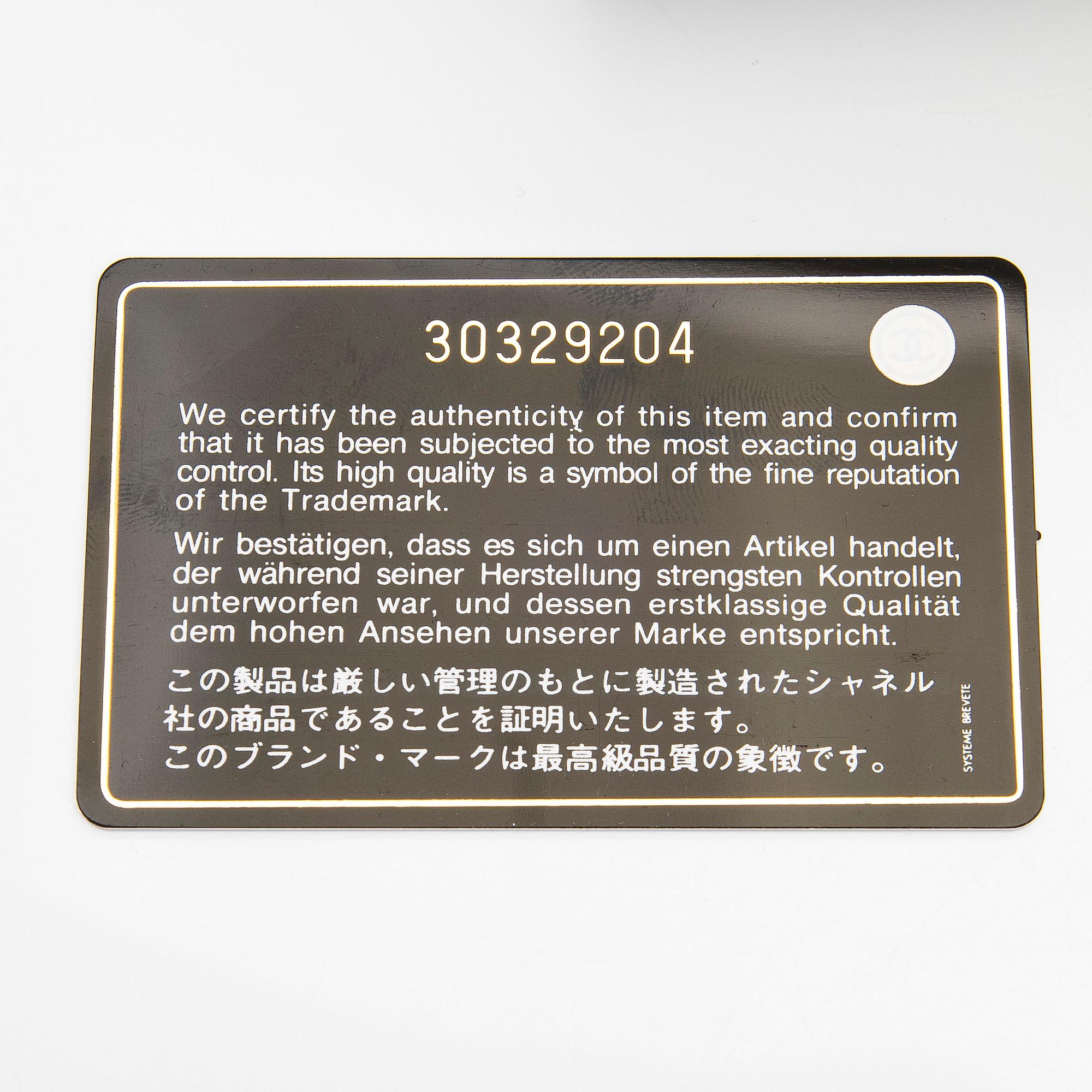 Chanel, A "19 O-coin purse" wallet.