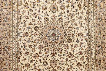 A Keshan carpet, c. 355 x 240 cm.