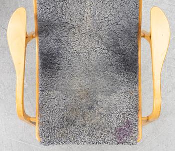 Yngve Ekström, a pair of 'Lamino' easy chairs, Swedese 2004.