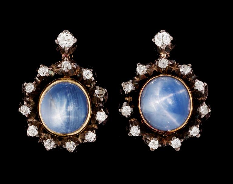 A pair of Russian gold/silver, diamond and blue star sapphires.