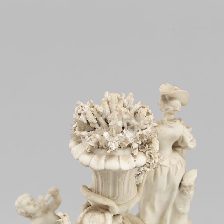 A porcelain figurine group circa 1900.