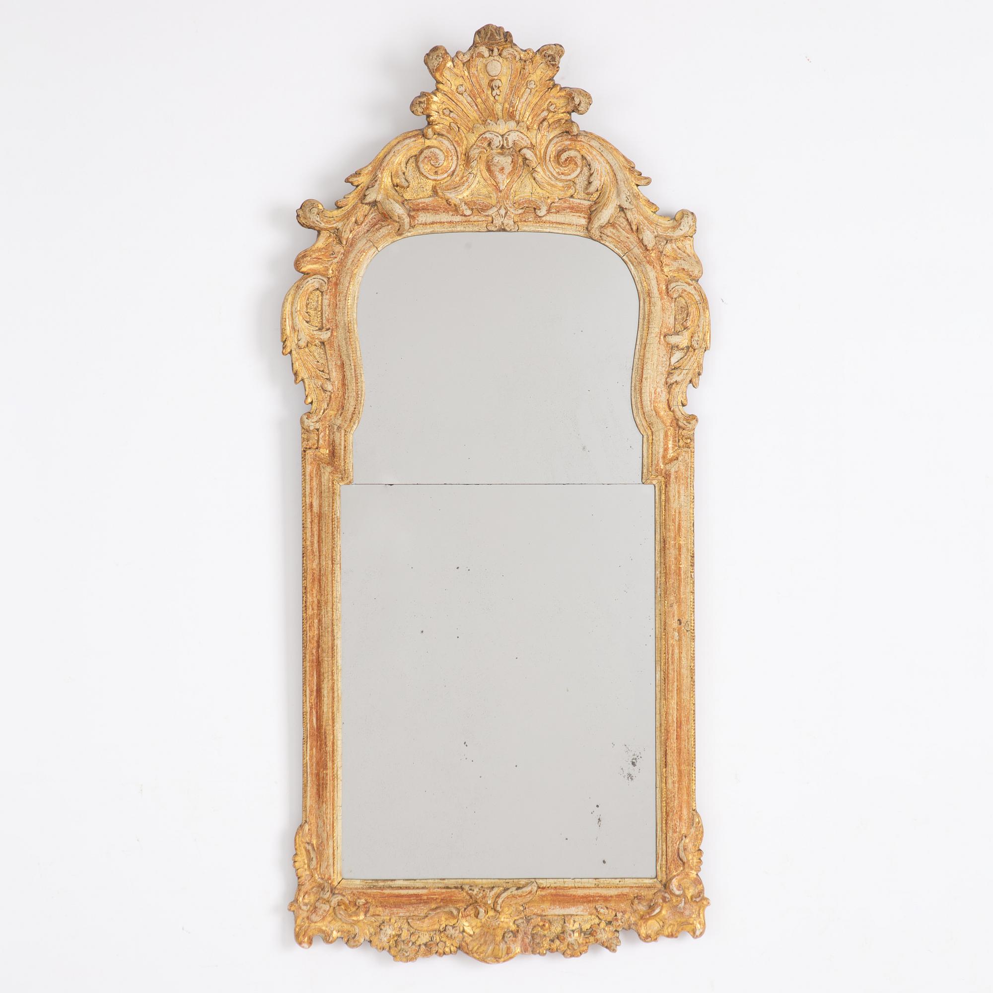 A rococo mirror, second half of the 18th century.