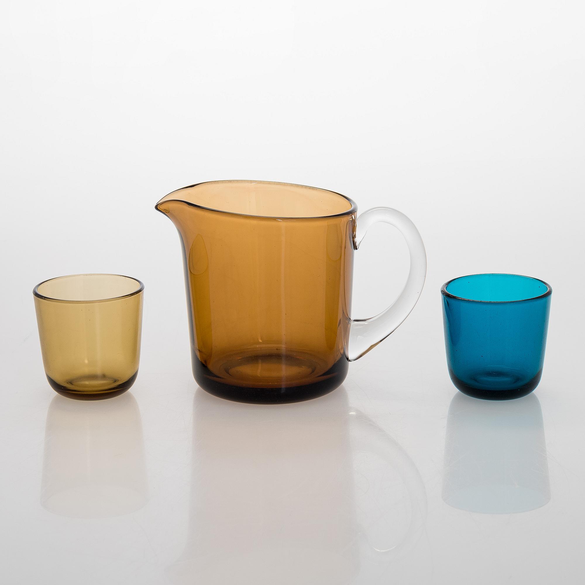 Kaj Franck, a mid-20th-century glass jug model 5601 and a set of 12 glasses model 5023, Nuutajärvi, Finland., a mid-20th-century g.