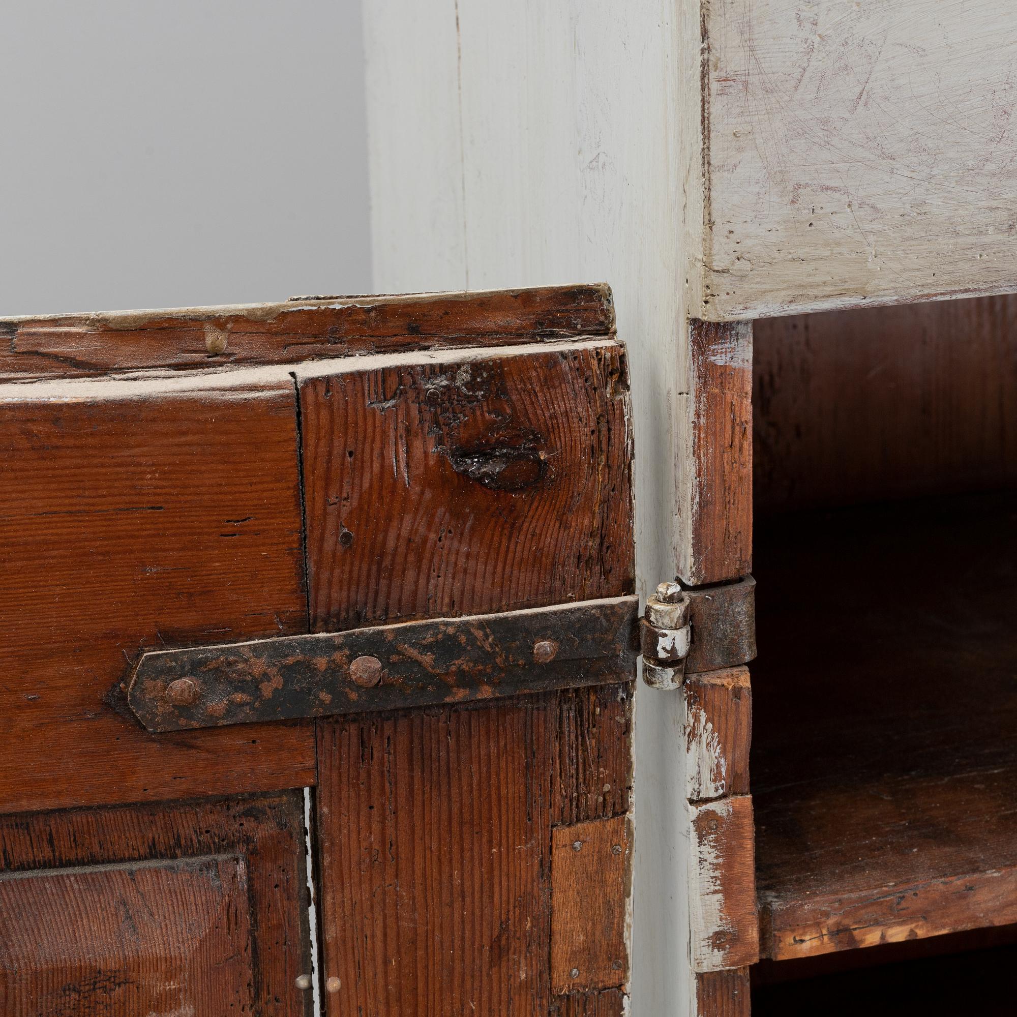 A 18/19th Century cabinet.