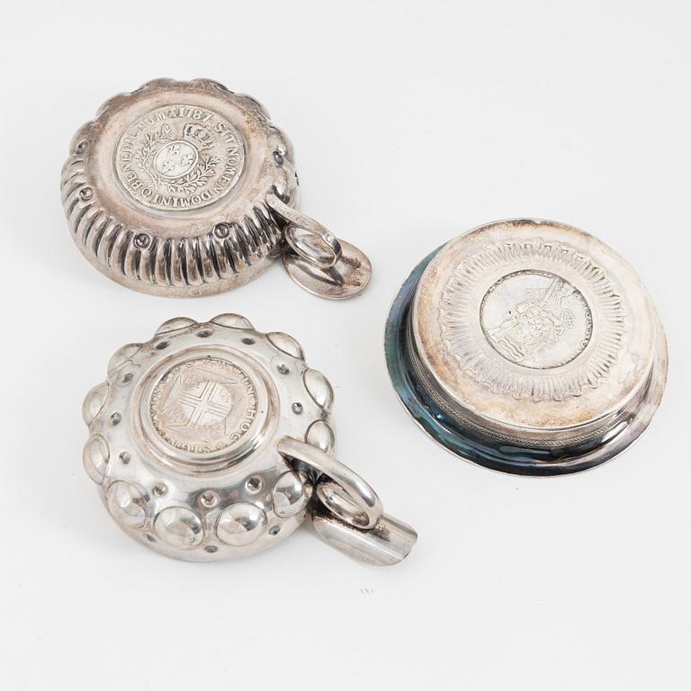 Six silver tastevin/wine tasting cups, including Gustave Keller, Paris, France, 19th/20th century.