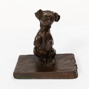 Ferdinand Notini, a bronze sculpture/paper weight, signed, 1908.