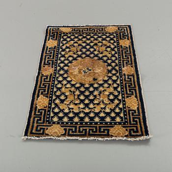 A semiantique Chinese Ningxia carpet ca 94 x 58 cm.