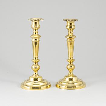A pair of bronze candlesticks, first half of the 19th century.