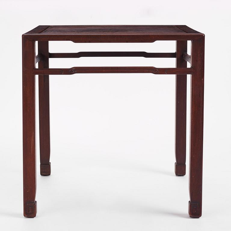 A Chinese hardwood corner-leg table, Qing dynasty.