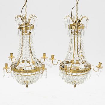 A contemporary pair of chandeliers.