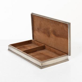A sterling silver cigarette box with Swedish import marks, presumably mid 20th century.