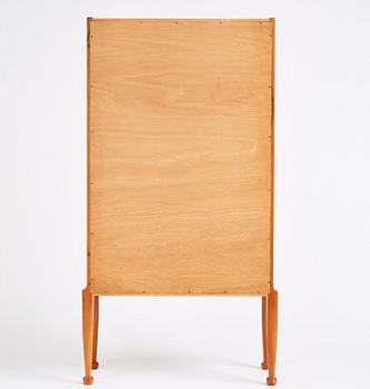 Josef Frank, a walnut showcase cabinet, Svenskt Tenn, Sweden, model B 2217, probably 1950s.